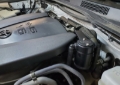 Picture of J&L 16-23 Toyota Tacoma 3.5L Driver Side Oil Separator 3.0 - Black Anodized