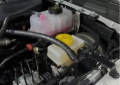 Picture of J&L 18-25 Jeep Wrangler JL 3.6L Driver Side Oil Separator 3.0 - Black Anodized