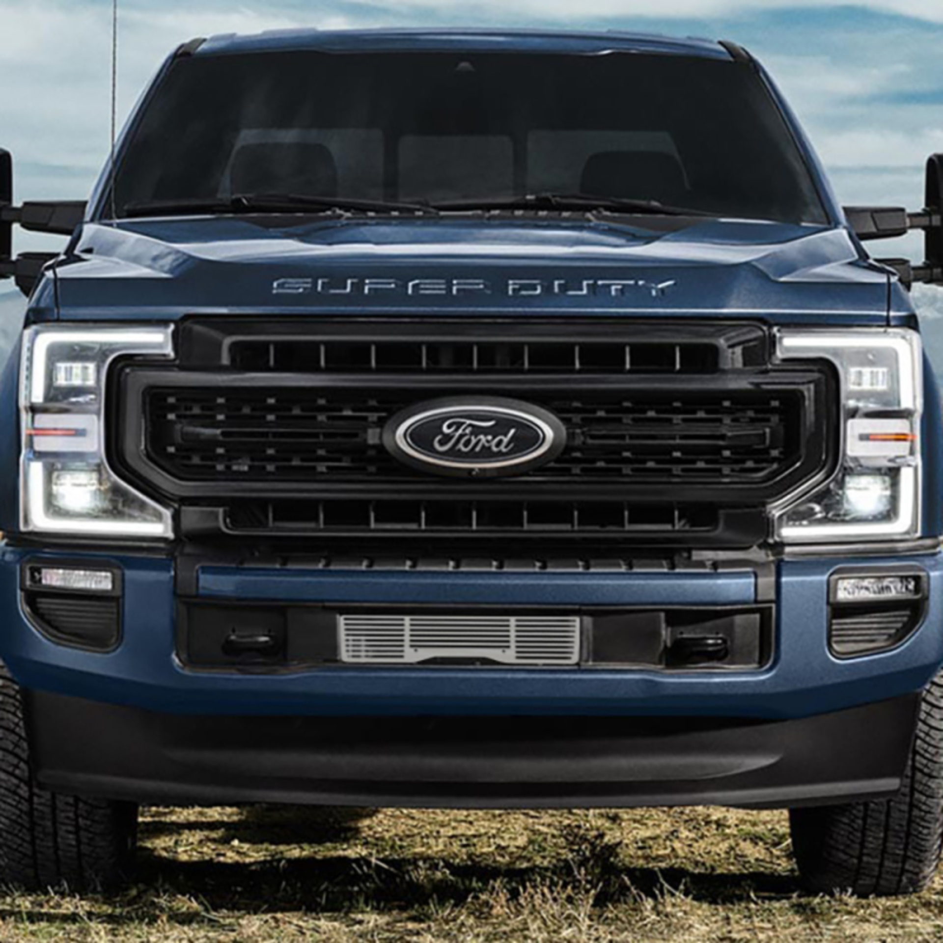 Picture of Putco 2020 Ford SuperDuty - Polished - Bar Pattern Bumper Grille Inserts