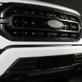 Picture of Putco 2020 Ford SuperDuty - Black Powder Coated - Bar Pattern Bumper Grille Inserts