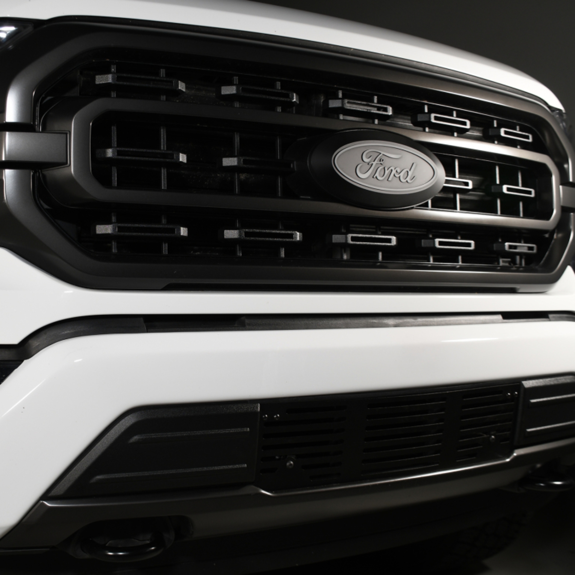 Picture of Putco 2020 Ford SuperDuty - Black Powder Coated - Bar Pattern Bumper Grille Inserts