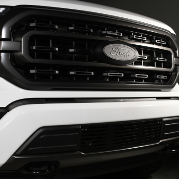Picture of Putco 2020 Ford SuperDuty - Black Powder Coated - Bar Pattern Bumper Grille Inserts