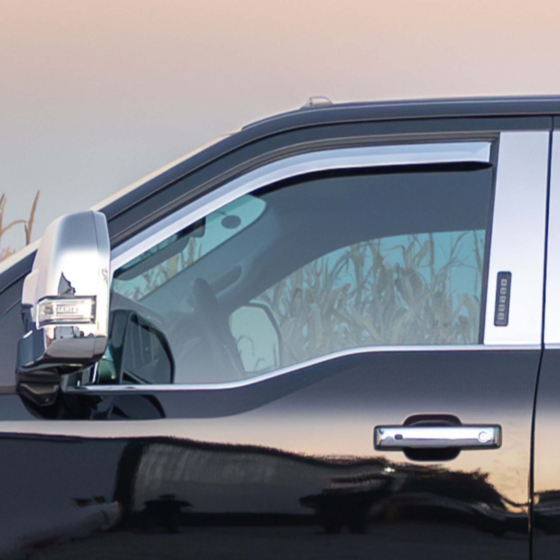 Picture of Putco 16-20 Nissan Titan Crew Cab (Set of 2) Front Only Element Chrome Window Visors