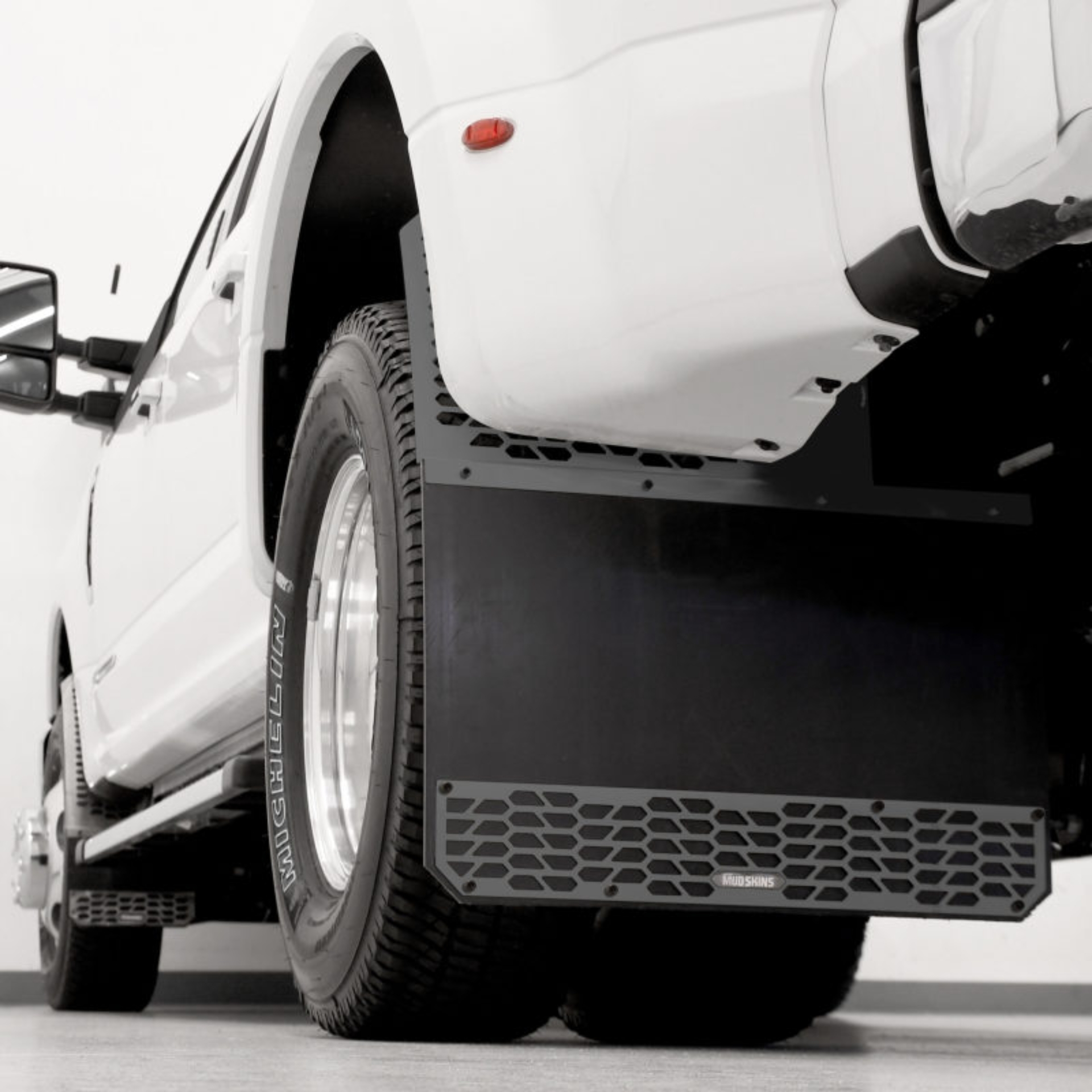 Picture of Putco 10-18 Ram HD Dually - (Fits Rear) - Set of 2 Mud Skins - HDPE w/ Hex Shield