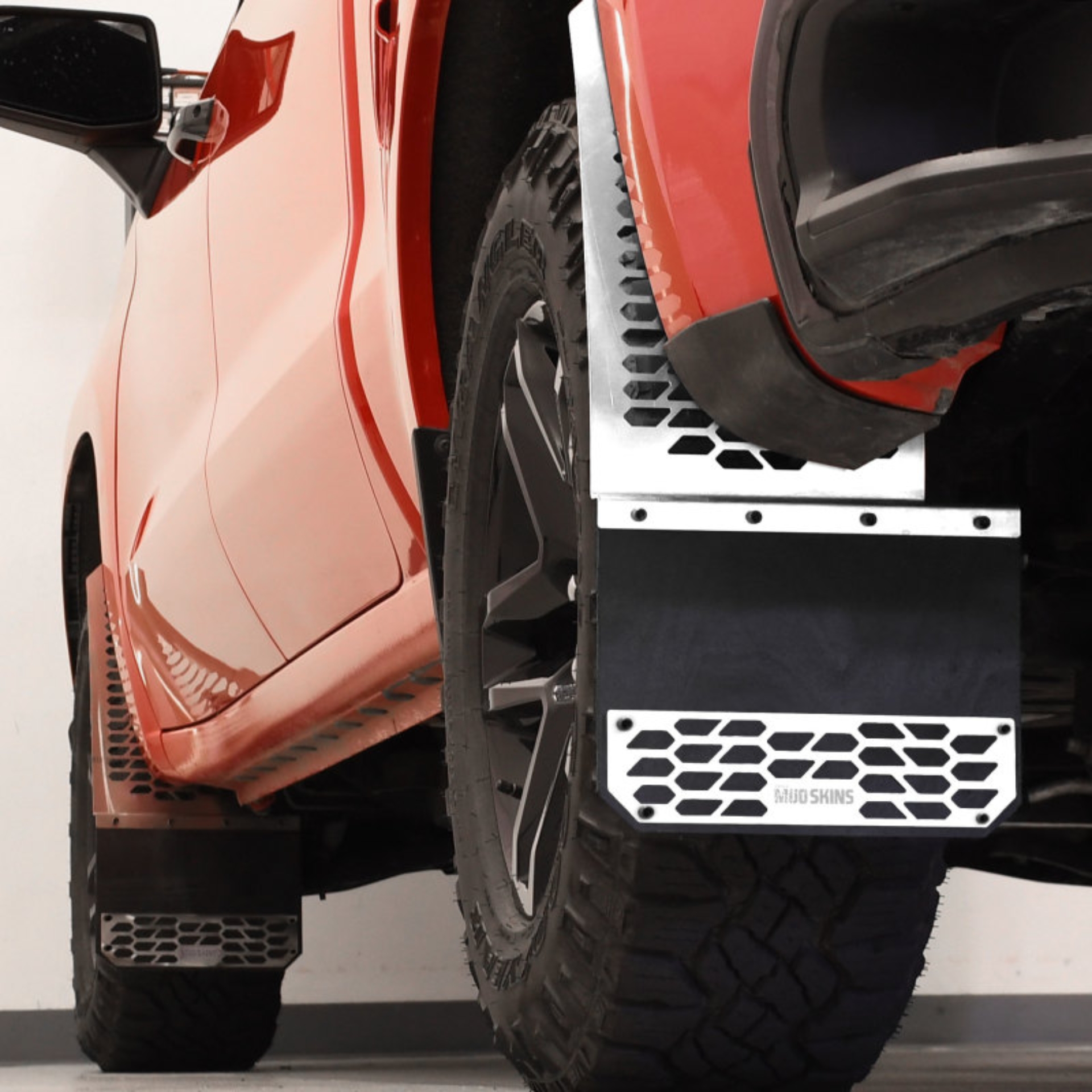 Picture of Putco 15-19 Chevy Silv/Sierra HD Dually (Front) - Set of 2 Mud Skins - Polished SS w/ Hex Shield