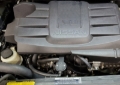 Picture of J&L 16-24 Nissan Titan 5.6L Passenger Side Oil Separator 3.0 - Black Anodized