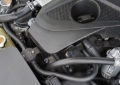 Picture of J&L 16-24 Infiniti Q50/Q60 3.0T Oil Separator 3.0 Driver Side - Black Anodized