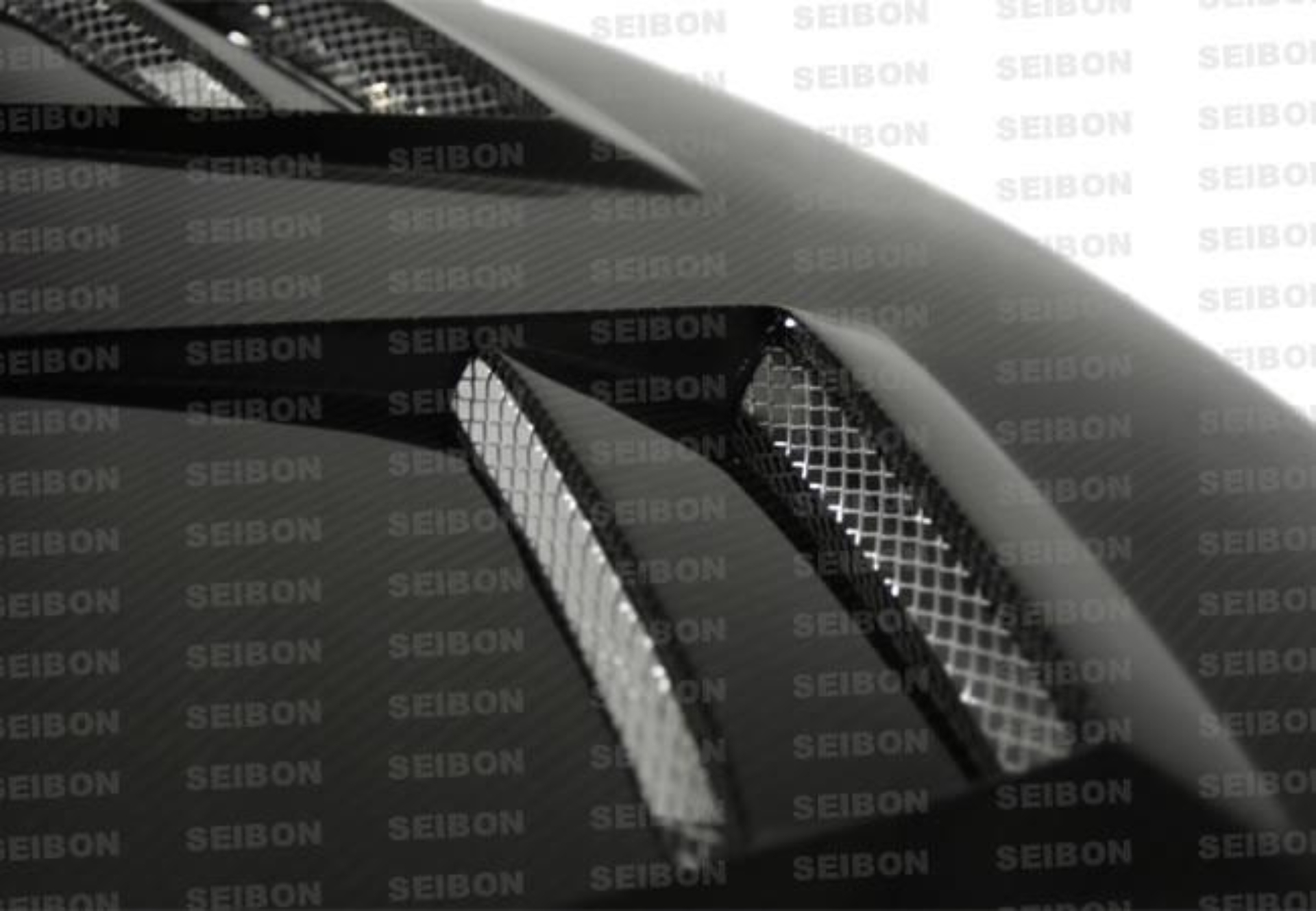 Picture of Seibon 08-09 Mitsubishi Lancer (CYA4/5A) DV Style Carbon Fiber Hood