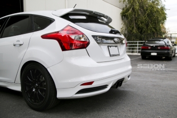 Picture of Seibon 12-13 Ford Focus 4 Door Carbon Fiber Tail Garnish