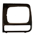 Picture of Omix LH Black Headlight Bezel 97-01 Jeep Cherokee (XJ)