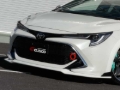 Picture of Cusco 19+ Toyota Corolla Hatchback Front Lip Spoiler (Primer/Unpainted)