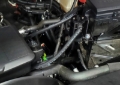 Picture of J&L 20-26 Chevy Silverado/GMC Sierra 2500/3500 6.6L Drivers Side Oil Separator 3.0 - Black Anodi