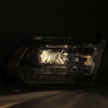 Picture of AlphaRex 09-18 Dodge Ram 2500 LUXX LED Proj Headlights Plank Style Black w/Activ Light/DRL