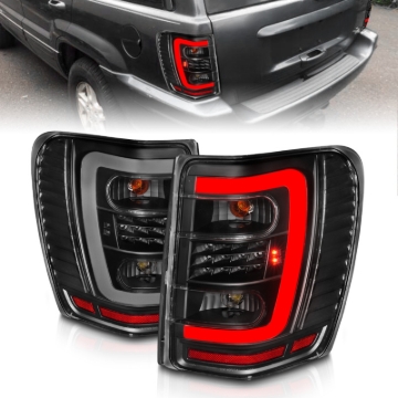 Picture of ANZO 1999-2004 Jeep Grand Cherokee LED Tail Lights w/ Light Bar Black Housing Clear Lens