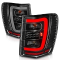 Picture of ANZO 1999-2004 Jeep Grand Cherokee LED Tail Lights w/ Light Bar Black Housing Clear Lens