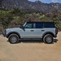 Picture of Westin 21-22 Ford Bronco (4-Door) PRO TRAXX 5 Oval Nerf Step Bars - Textured Black