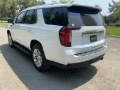 Picture of Gibson 21-22 Chevy Suburban 5.3L 2.5in Cat-Back Dual Split Exhaust System Stainless - Black Elite