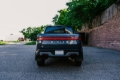 Picture of Rally Armor 22-25 Rivian R1T Black UR Mud Flap w/Tangerine Scream Logo