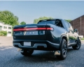 Picture of Rally Armor 22-25 Rivian R1T Black UR Mud Flap w/Tangerine Scream Logo
