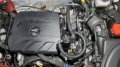 Picture of J&L 20-23 Buick Encore GX / Chevrolet Trailblazer Driver Side Oil Separator 3.0 - Black Anodized