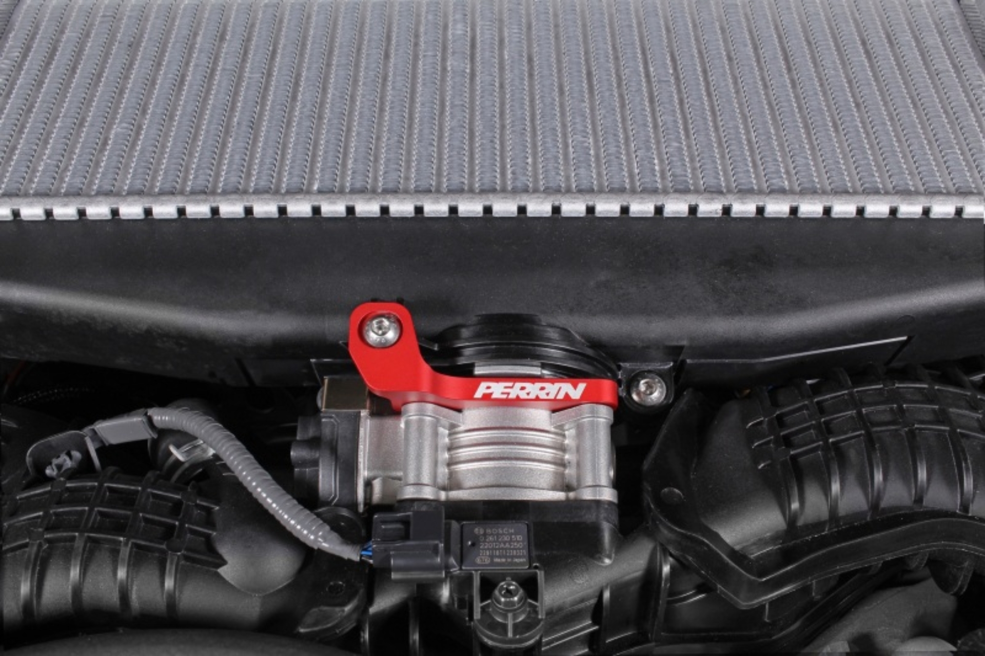Picture of PERRIN 22-26 Subaru WRX / 19-25 Ascent / 20-25 Outback & Legacy Turbo TMIC Bracket - Red