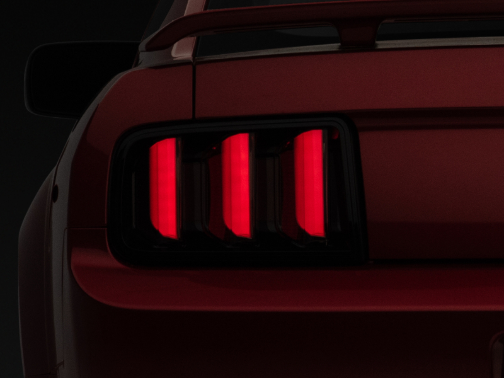Picture of Raxiom 05-09 Ford Mustang Vector V2 LED Tail Lights- Black Housing (Smoked Lens)