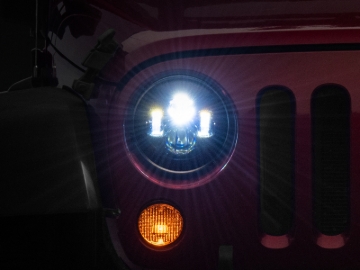 Picture of Raxiom 97-18 Jeep Wrangler TJ/JK Axial Series LED Daymaker Headlights- Black Housing (Clear Lens)