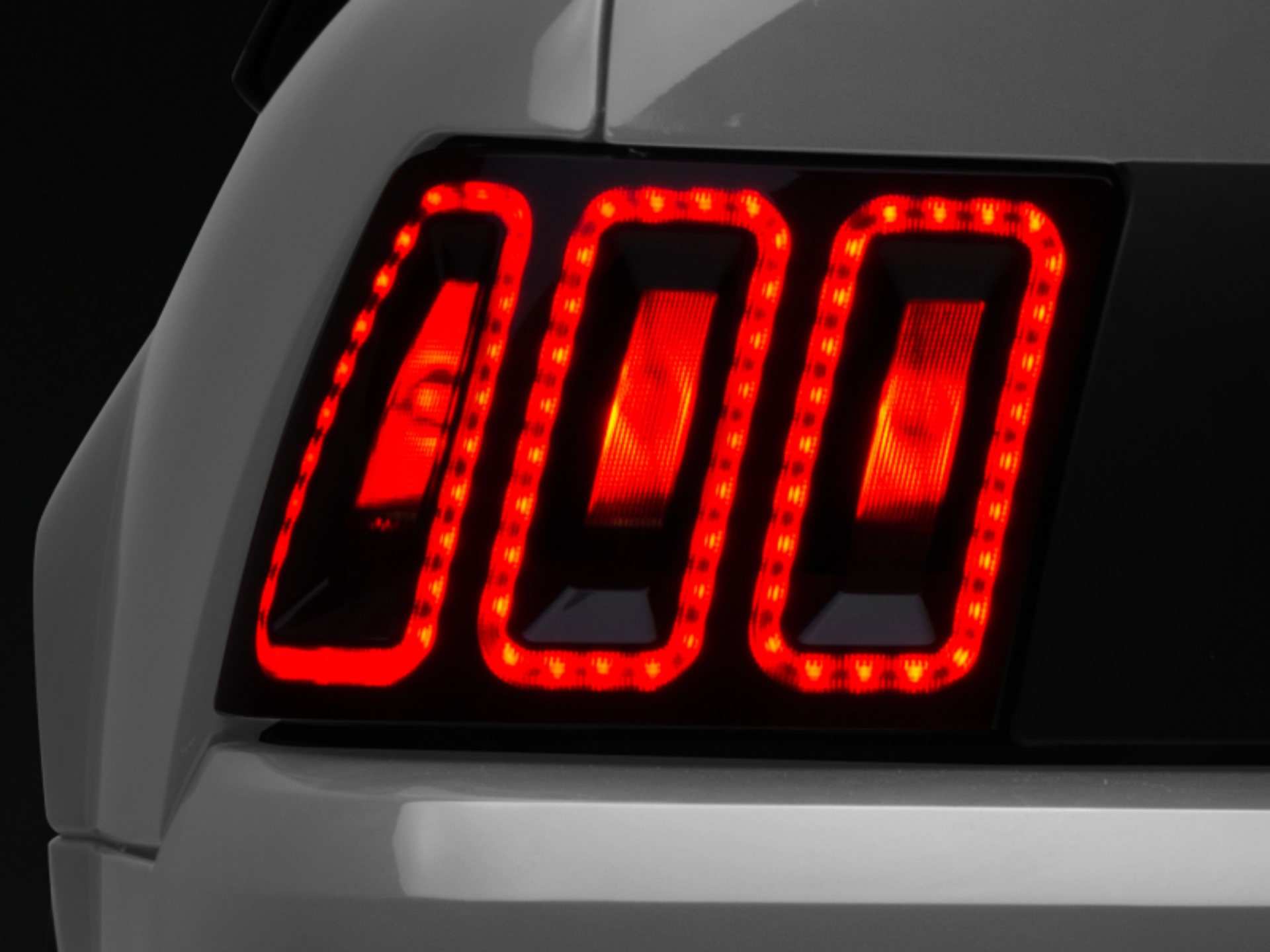 Picture of Raxiom 99-04 Ford Mustang Excluding 99-01 Cobra Icon LED Tail Lights- Black Housing (Smoked Lens)