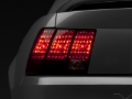 Picture of Raxiom 99-04 Ford Mustang Excluding 99-01 Cobra Tail Lights- Black Housing (Smoked Lens)