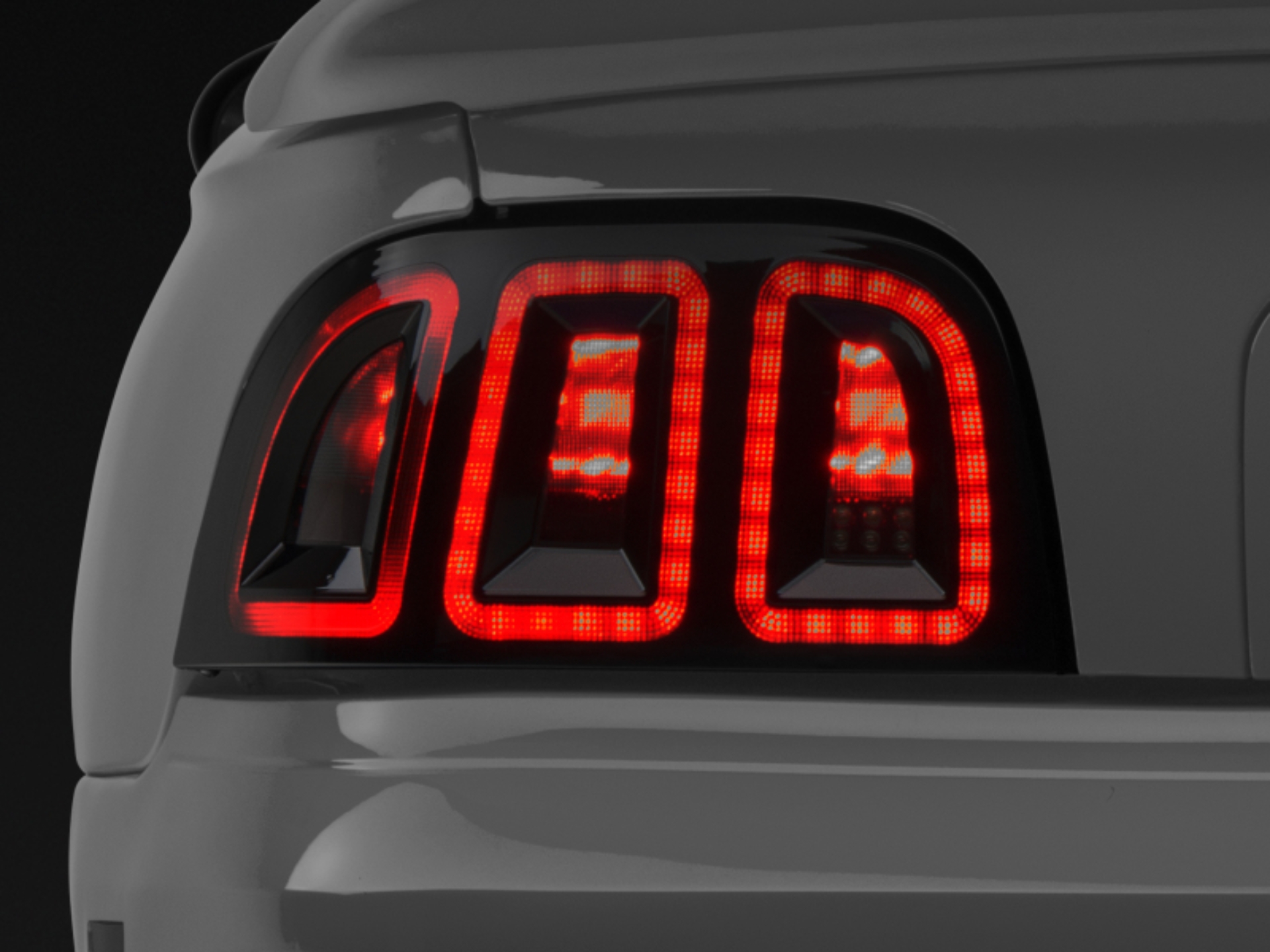 Picture of Raxiom 96-98 Ford Mustang Icon LED Tail Lights- Black Housing (Smoked Lens)