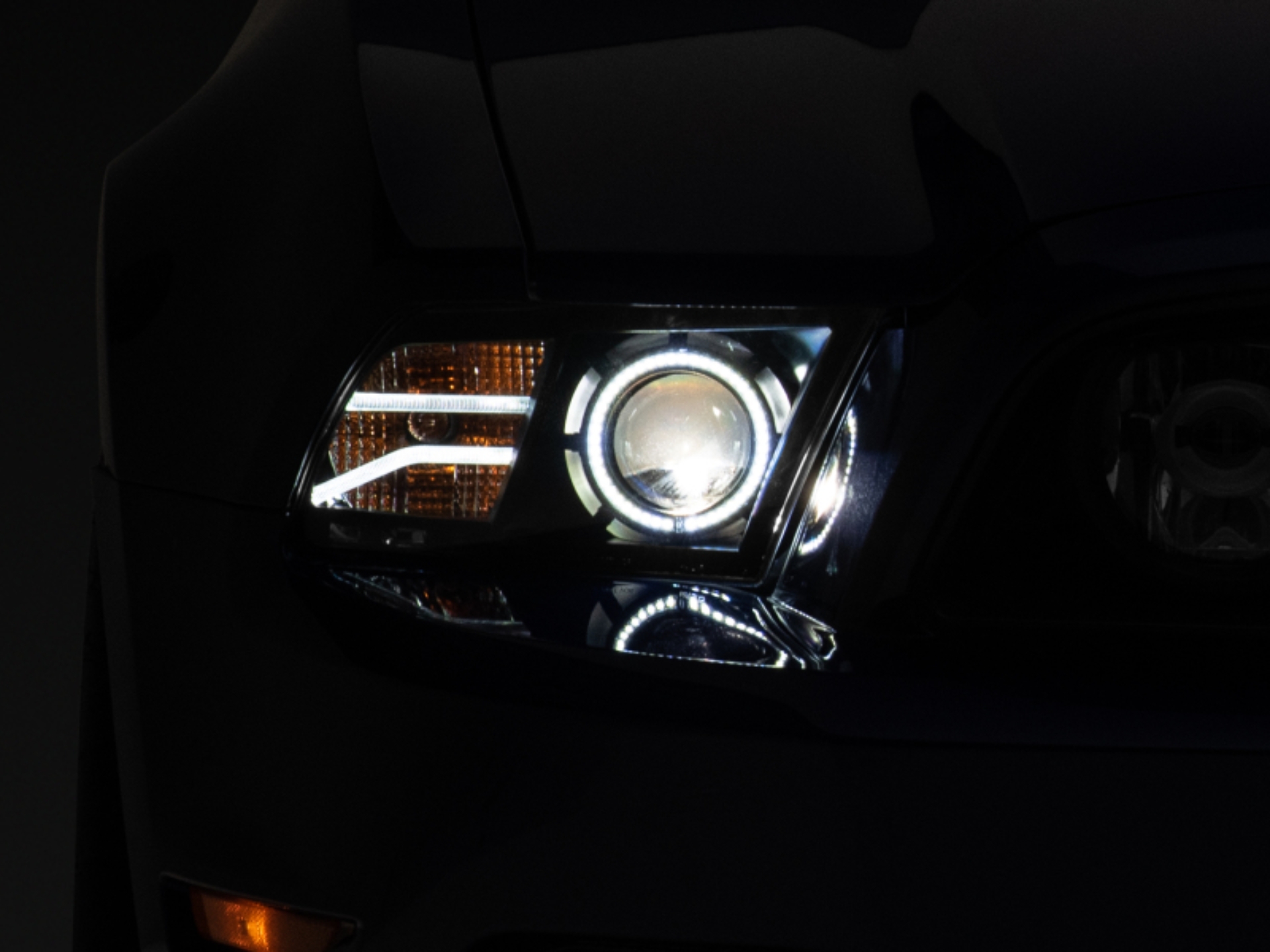 Picture of Raxiom 13-14 Ford Mustang LED Halo Projector Headlights- Black Housing (Clear Lens)