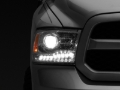 Picture of Raxiom 09-18 Dodge RAM 1500 LED Halo Headlights w/ Switchback Turn Signals- Chrome Hsng (Clear Lens)