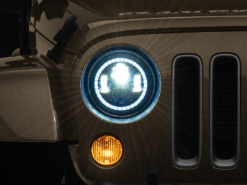 Picture of Raxiom 97-18 Jeep Wrangler TJ/JK Axial 7-Inch LED Headlights w/RGB Halo- Black Housing (Clear Lens)