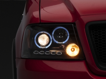 Picture of Raxiom 04-08 Ford F-150 Dual LED Halo Projector Headlights- Black Housing (Clear Lens)