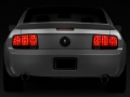 Picture of Raxiom 05-09 Ford Mustang Tail Lights- Black Housing (Smoked Lens)