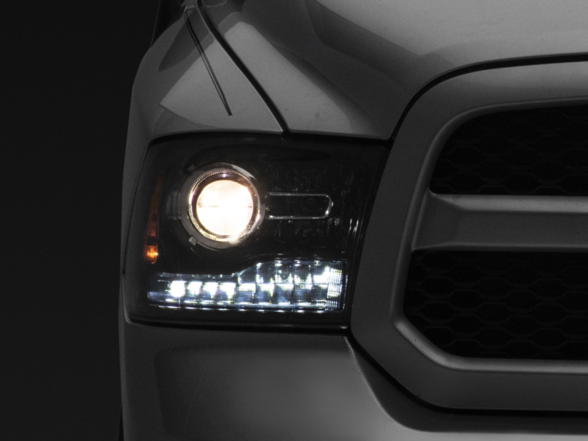 Picture of Raxiom 09-18 Dodge RAM 1500 LED Halo Headlights w/Switchback Turn Signals- Blk Housing (Clear Lens)