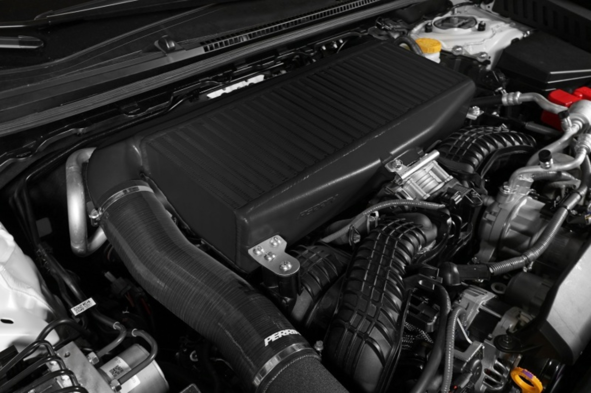 Picture of PERRIN 22-26 Subaru WRX / 19-25 Ascent / 20-25 Outback & Legacy Turbo Top Mount Intercooler - Black