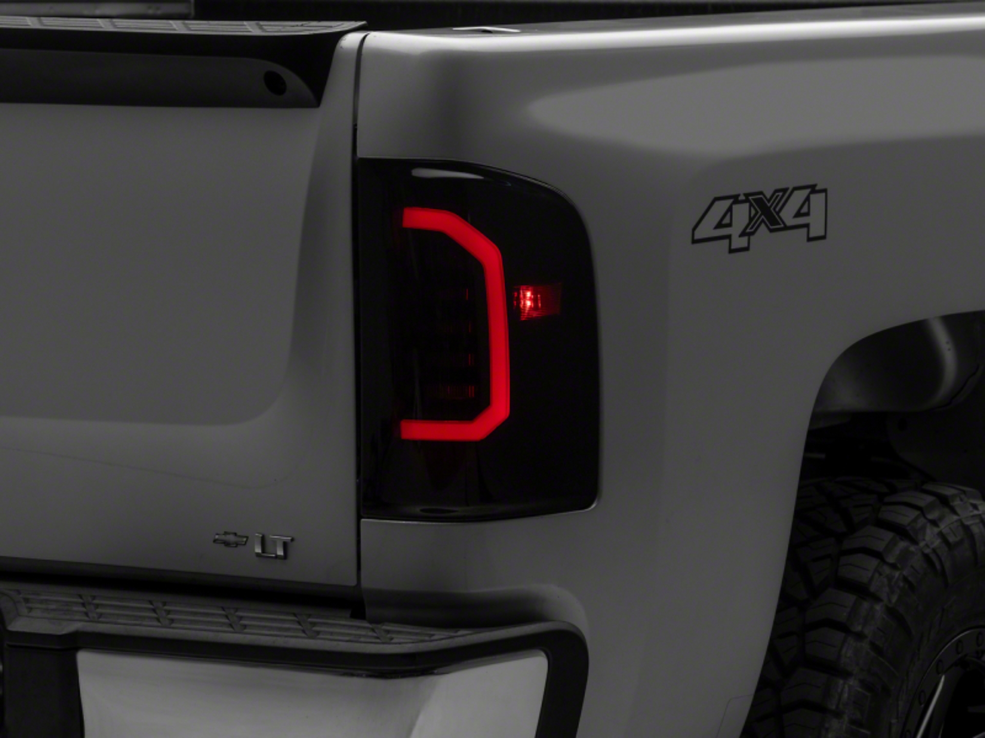 Picture of Raxiom 07-14 Chevrolet Silverado 1500 Axial Series LED Tail Lights- Black Housing (Smoked Lens)