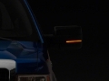 Picture of Raxiom 09-14 Ford F-150 Axial Series Sequential LED Mirror Mounted Turn Signals- Smoked