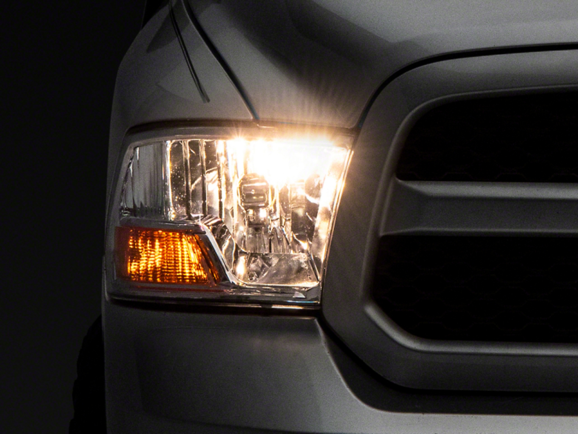 Picture of Raxiom 09-18 Dodge RAM 1500 Axial OEM Rep Headlights w/ Single Bulb- Chrome Housing (Clear Lens)