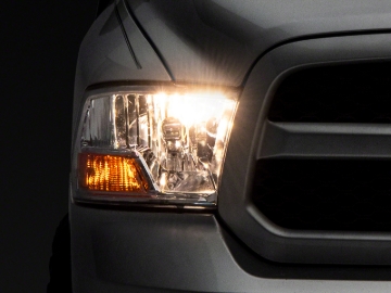 Picture of Raxiom 09-18 Dodge RAM 1500 Axial OEM Rep Headlights w/ Single Bulb- Chrome Housing (Clear Lens)