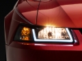 Picture of Raxiom 99-04 Ford Mustang Axial Series Headlights w/ LED Bar- Black Housing (Clear Lens)