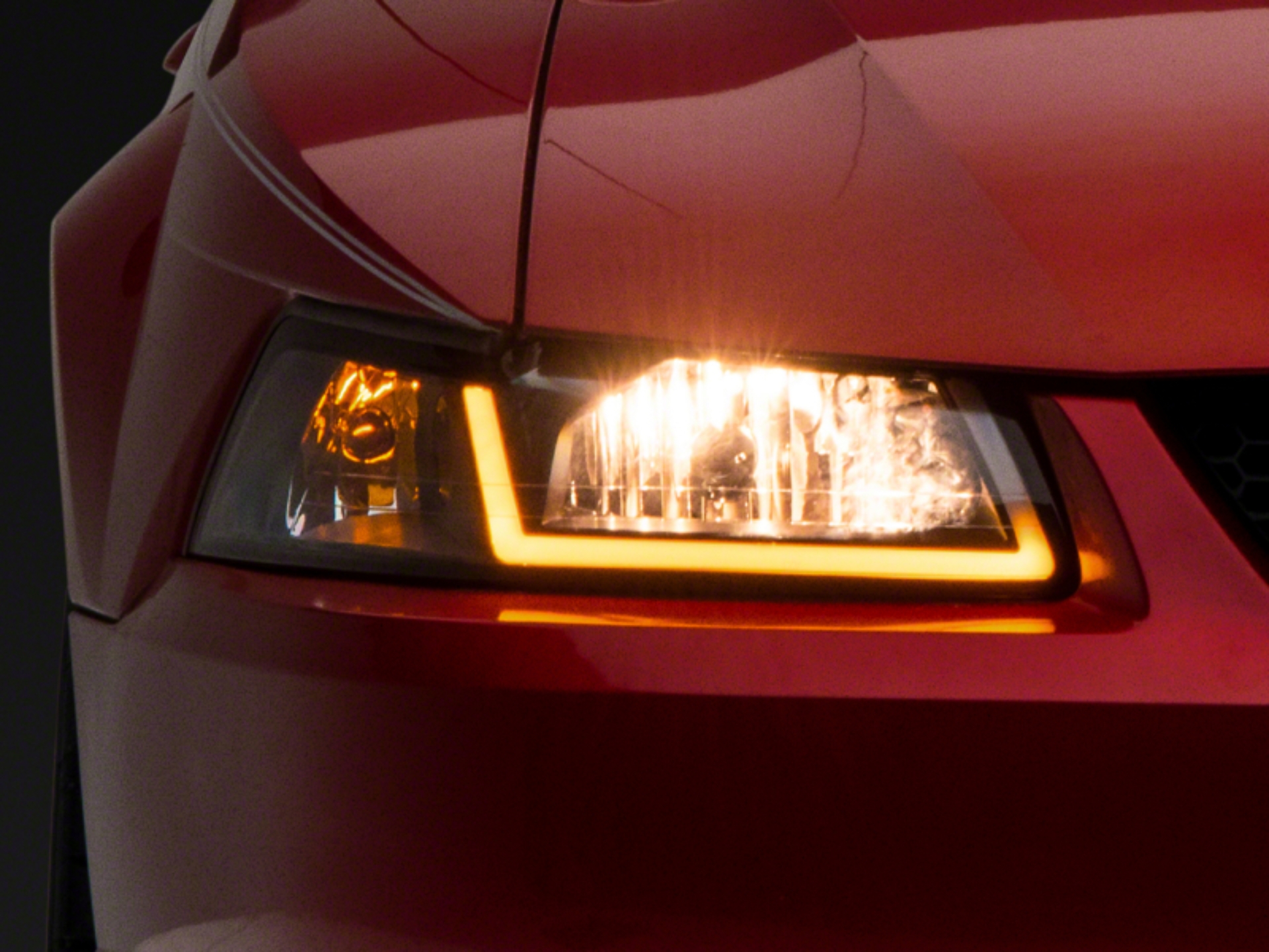 Picture of Raxiom 99-04 Ford Mustang Axial Series Headlights w/ Sequential LED Bar- Black Housing (Clear Lens)