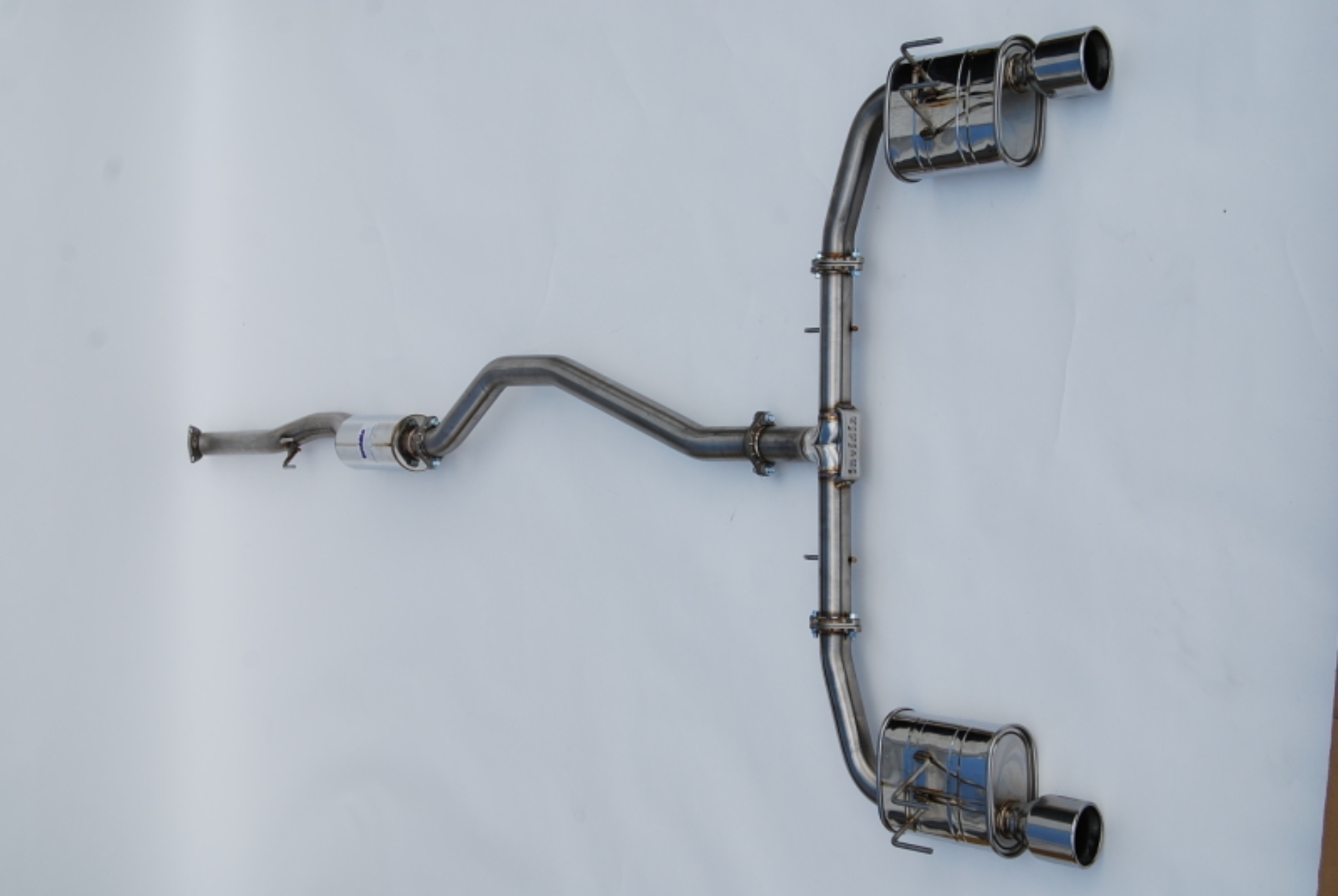 Picture of Invidia 2022+ Honda Civic Si (1.5T) 70mm Q300 Cat Back Exhaust - Rolled SS Tips