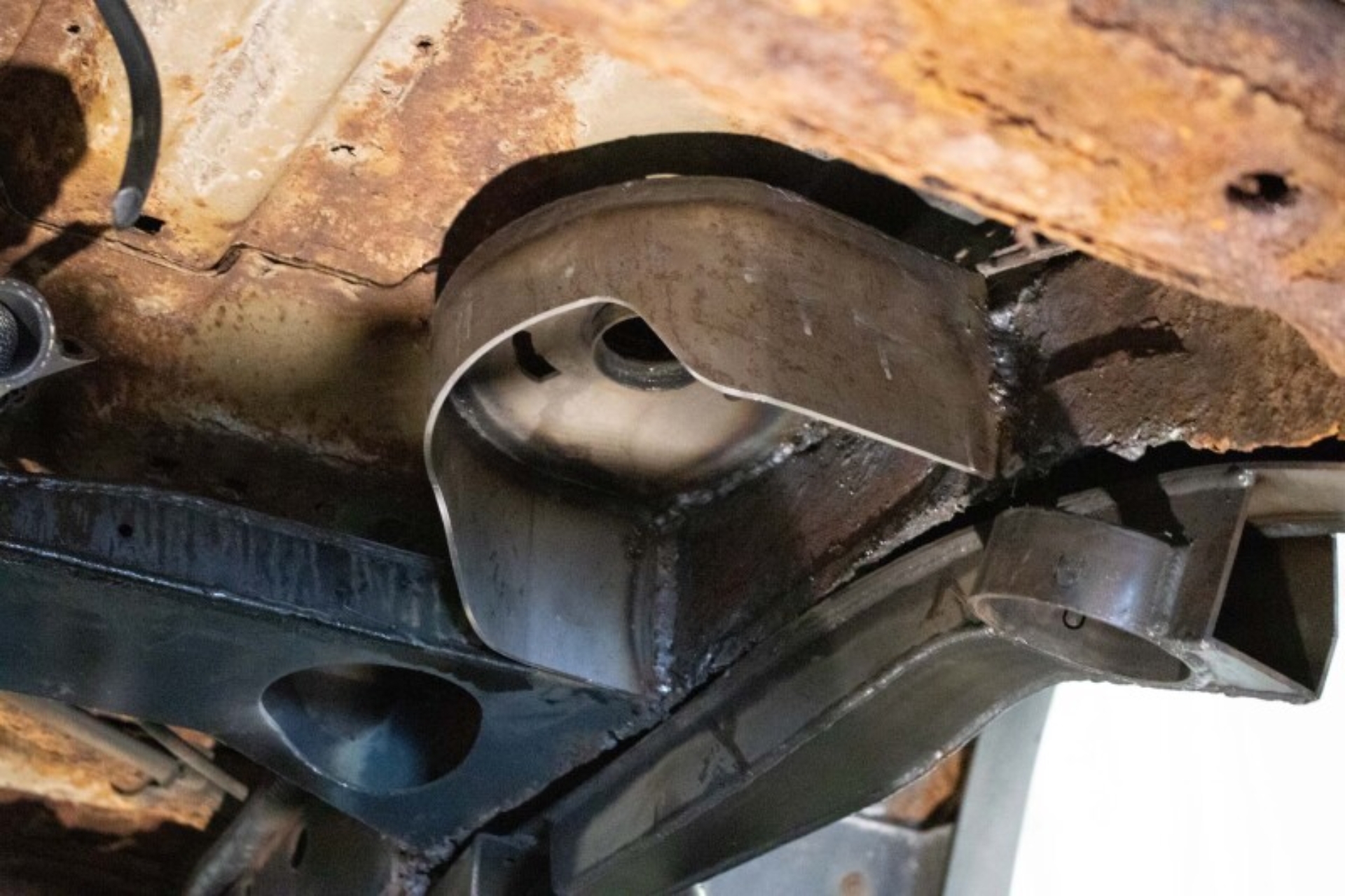 Picture of Rust Buster Avalanche/Suburban/Yukon Rear Upper Coil Spring Bucket - Left