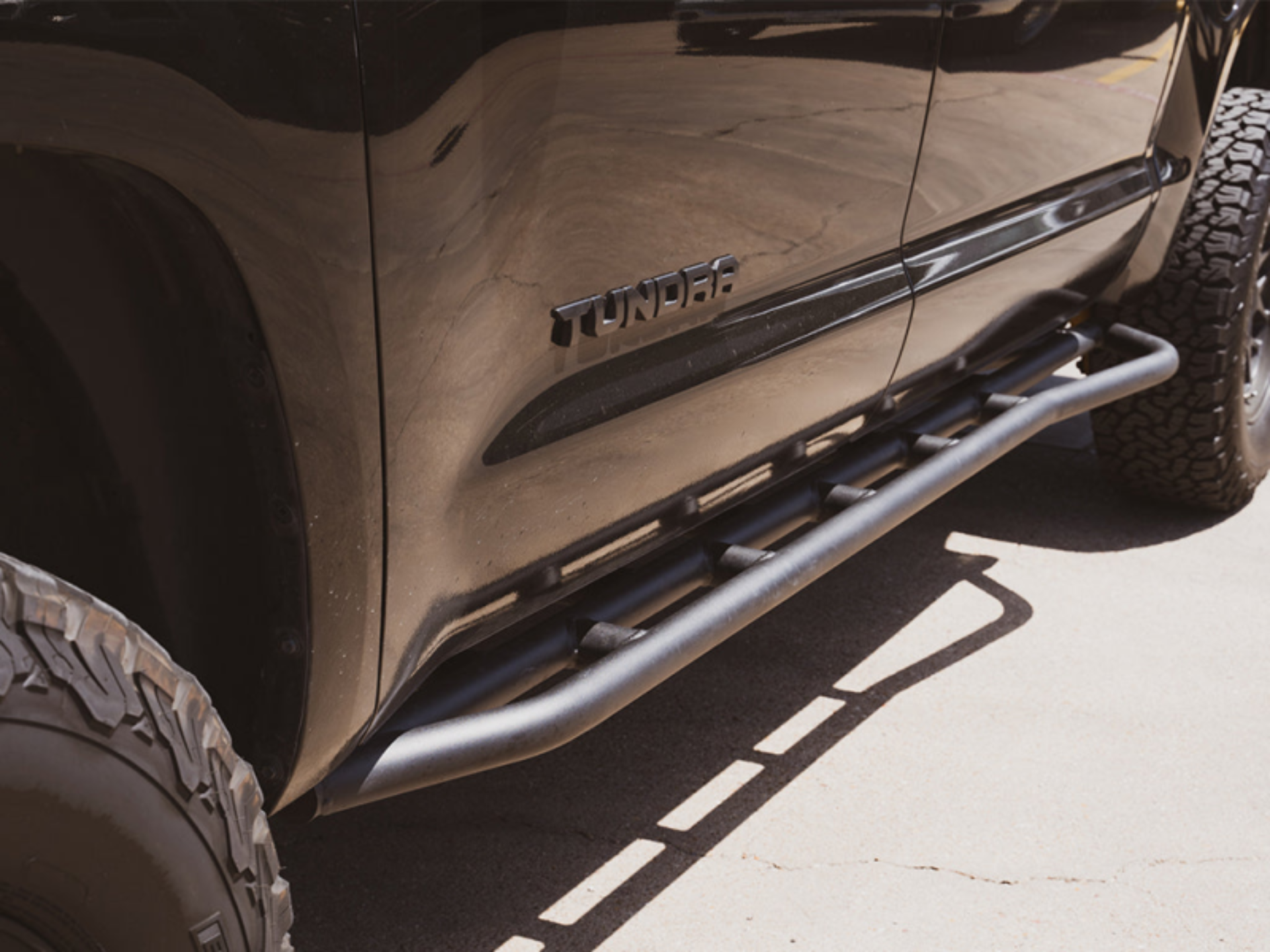 Picture of Cali Raised 14-21 Toyota Tundra Trail Edition Rock Sliders - Kick Out / Raw