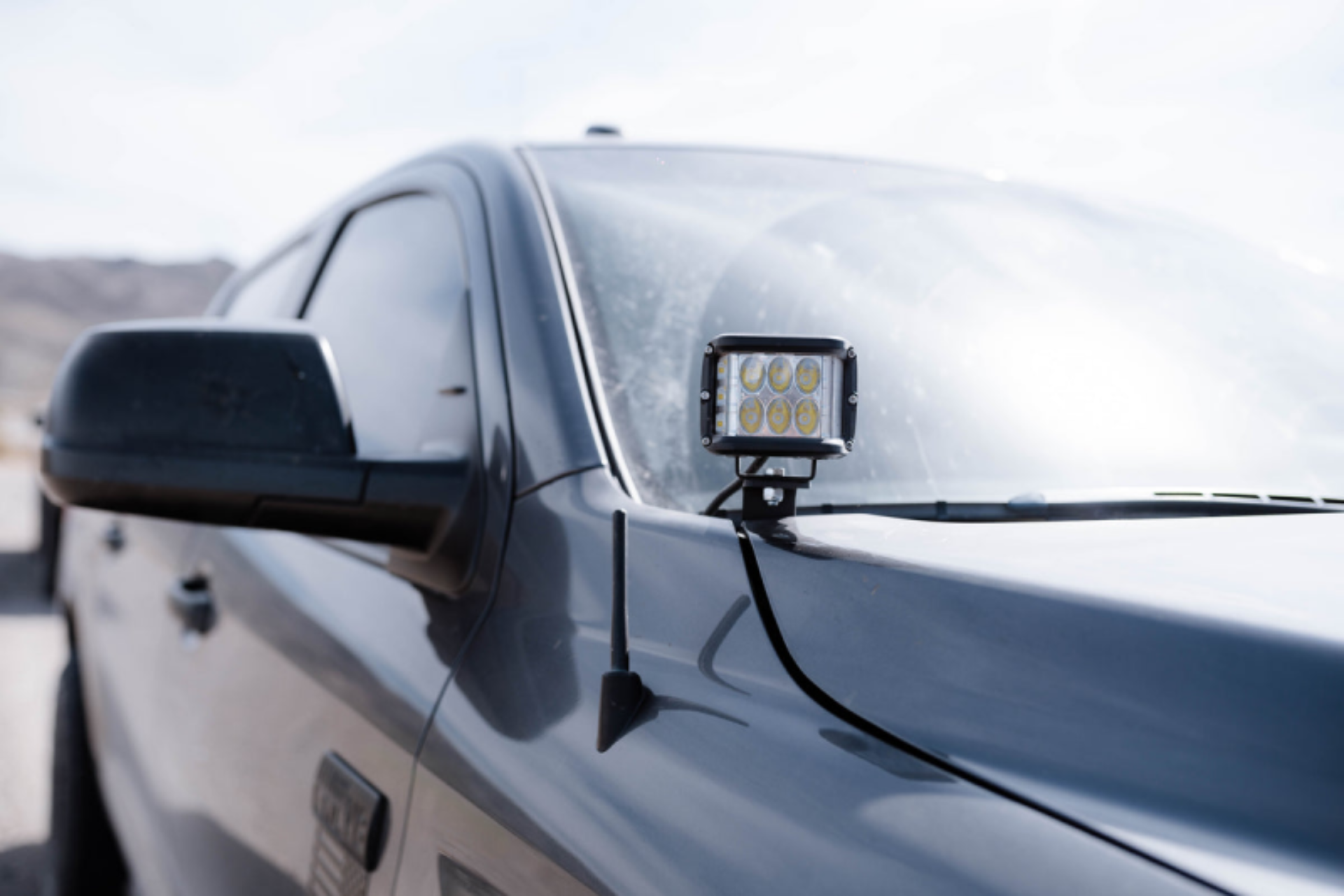 Picture of Cali Raised 14-21 Toyota Tundra Low Profile Ditch Light Kit - Brackets Blue Backlight - Small (27W)