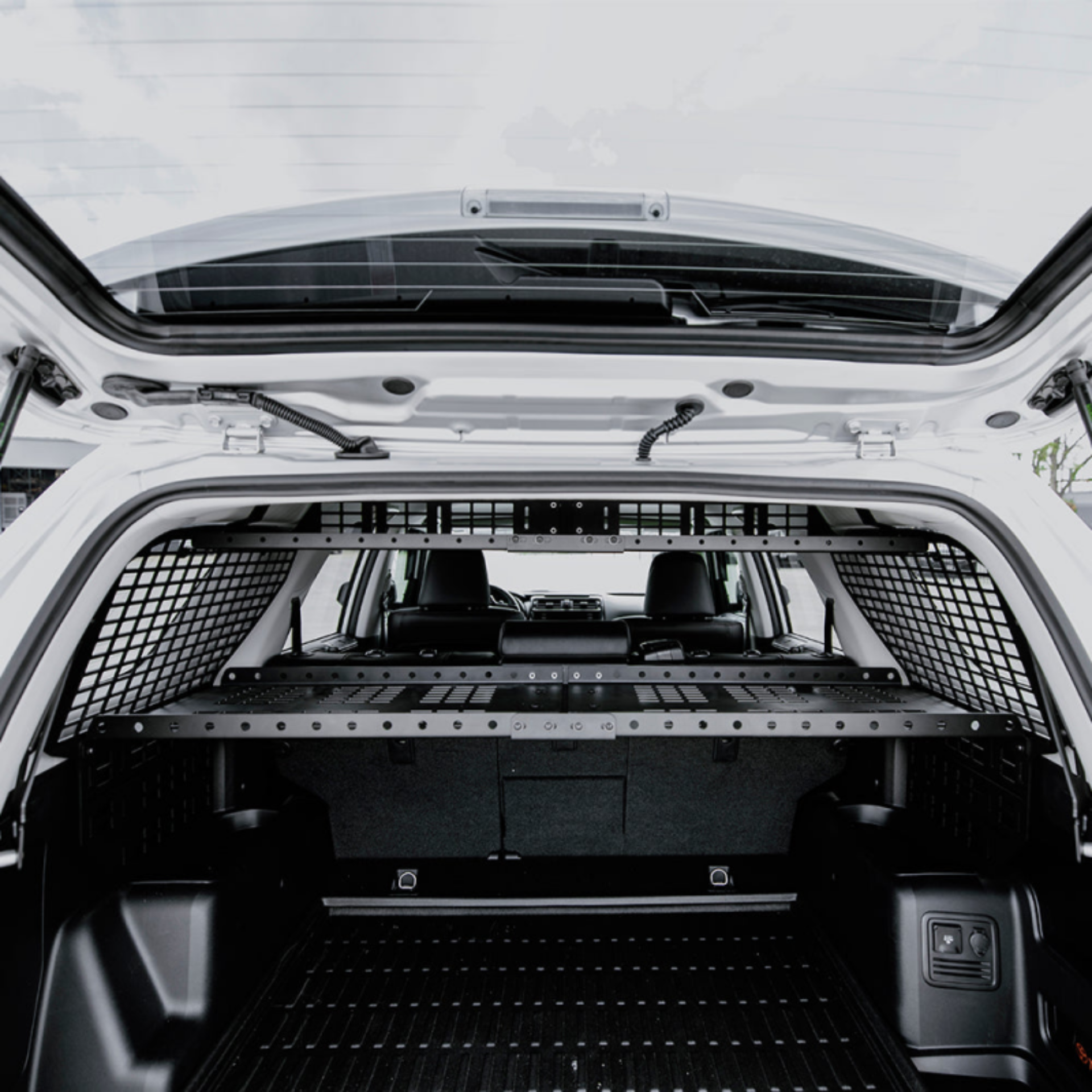 Picture of Cali Raised 10-24 Toyota 4Runner Interior Rear Molle Panel - 3 Row Seating / Both Sides & Upper Tray