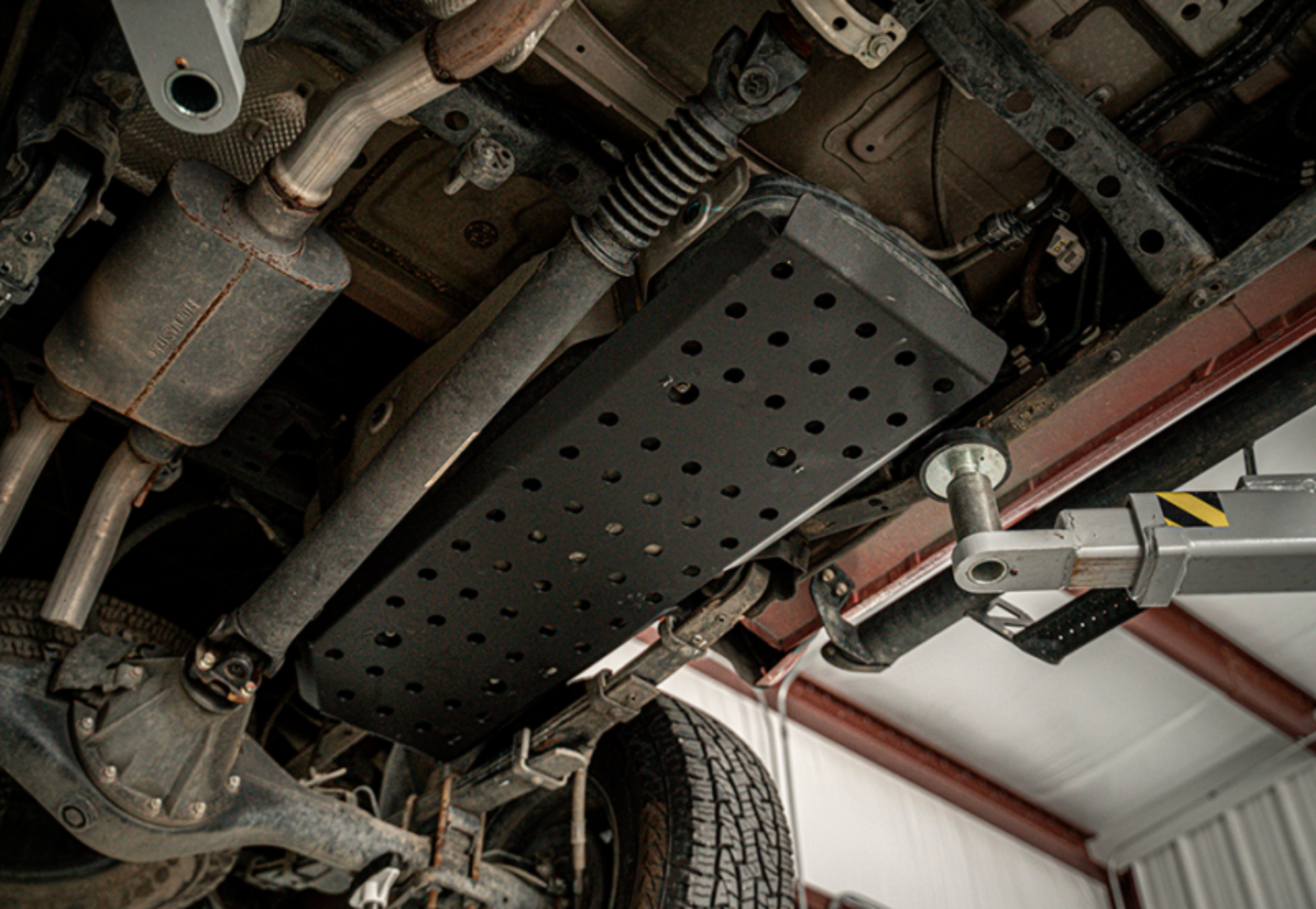 Picture of Cali Raised 05-23 Dcsb / Ac Toyota Tacoma Fuel Tank Skid Plate - Steel / Powder Coat