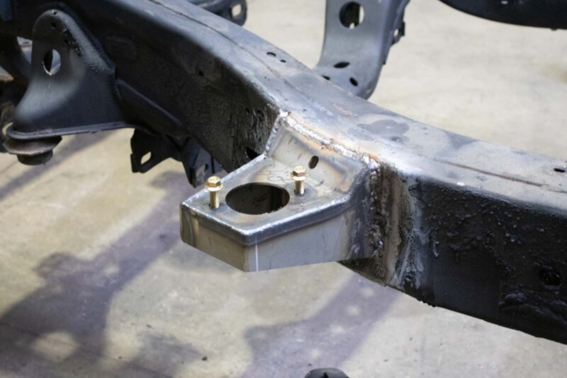 Picture of RustBust 05-15 Toyota Tacoma Access Cab and Crew Cab Front Body Mount Left